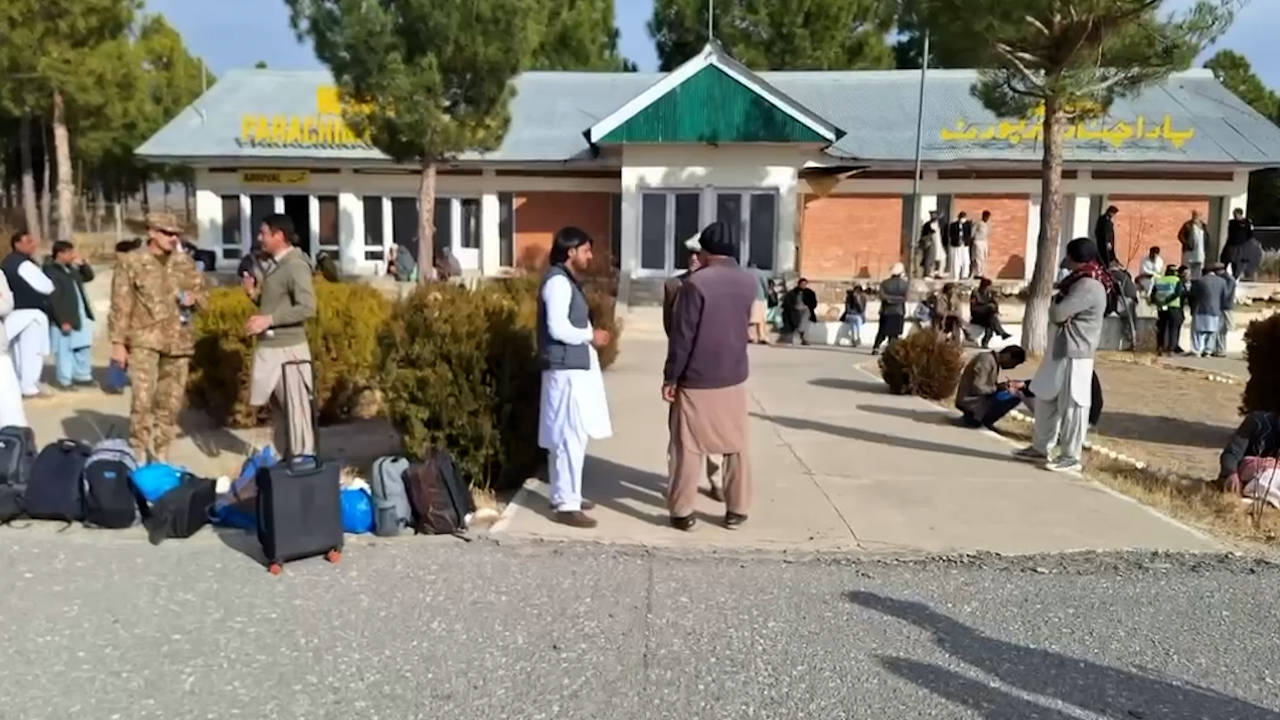 The still image taken from the video shared by Khyber Pakhtunkhwa chief minister's office on December 22, 2024, shows people awaiting to be rescued via helicopter in Pakistan's northwestern Kurram district. (Khyber Pakhtunkhwa CM Office)