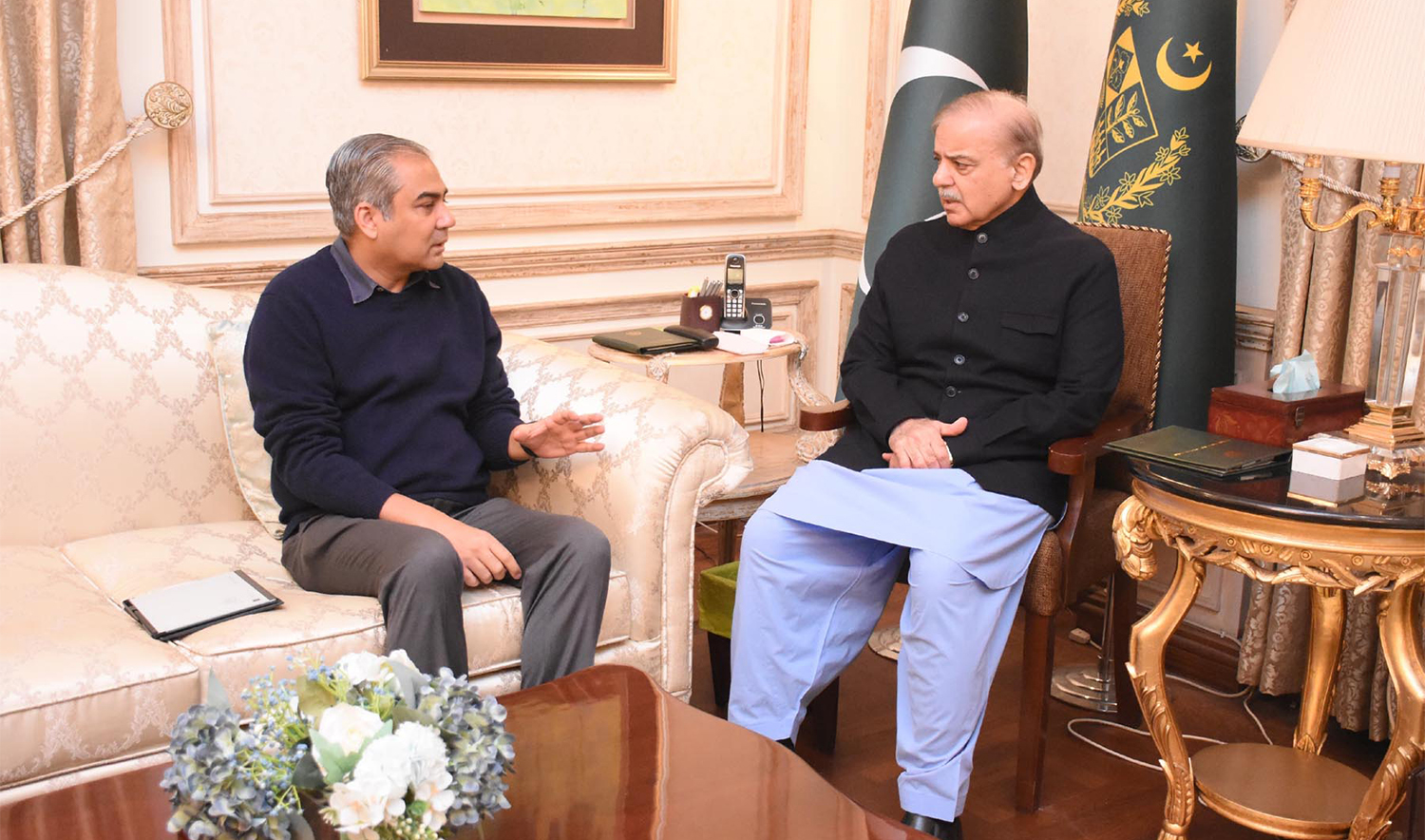 Pakistan's Interior Minister Mohsin Naqvi (left) calls on Prime Minister Shehbaz Sharif in Lahore, Pakistan, on December 22, 2024. (PID)
