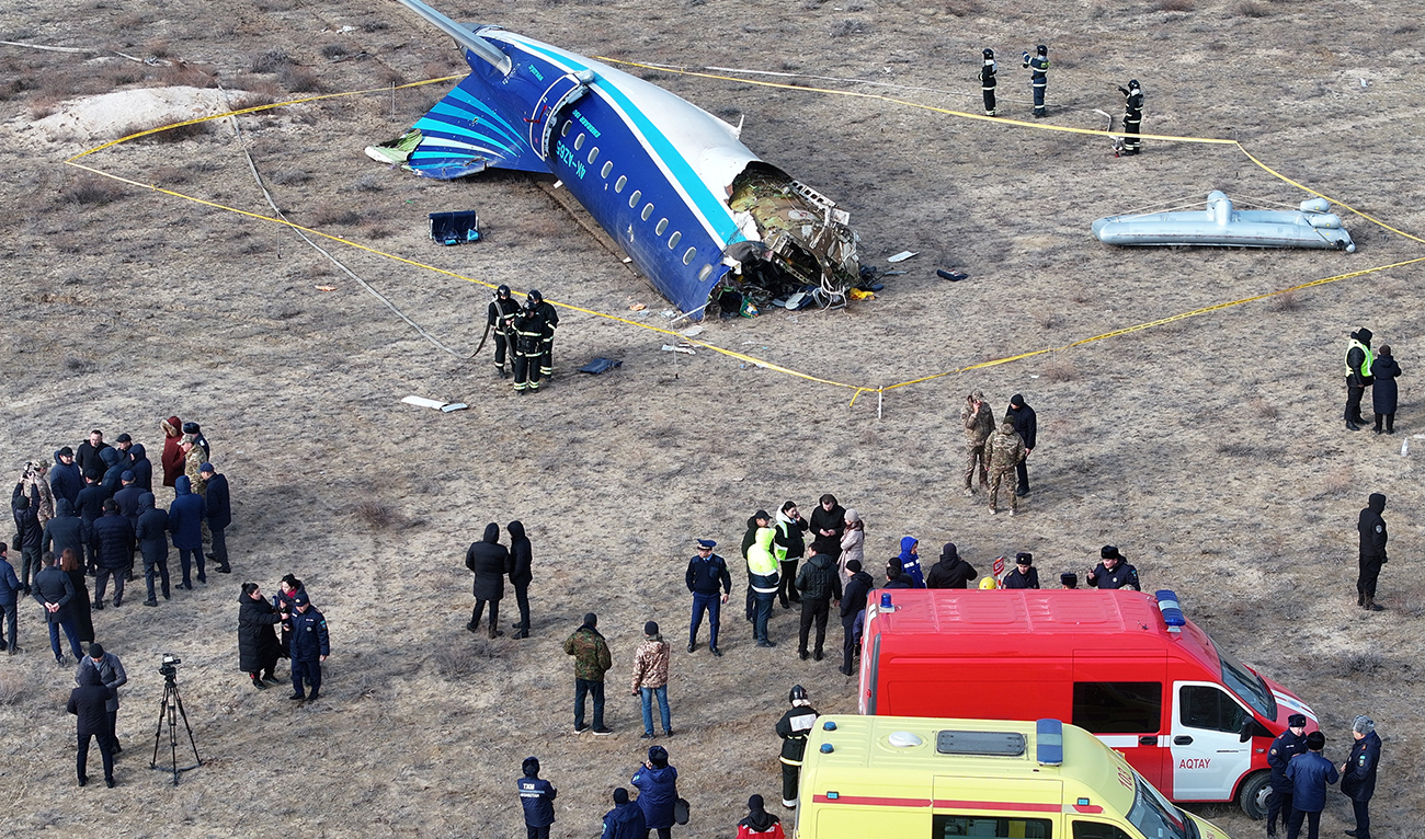 A drone view shows emergency specialists working at the crash site of an Azerbaijan Airlines passenger plane near the city of Aktau, Kazakhstan on December 25, 2024. (REUTERS)