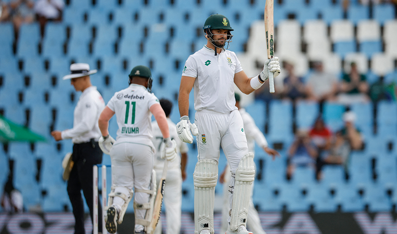 South Africa's Aiden Markram (R) celebrates after scoring a half-century (50 runs) during the second day of the first cricket Test match between South Africa and Pakistan at SuperSport Park in Centurion on December 27, 2024. (AFP)