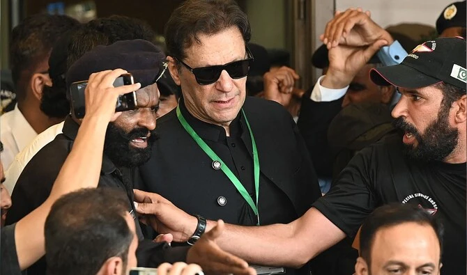 Pakistan’s former Prime Minister Imran Khan (C) leaves after appearing in the Supreme Court in Islamabad on July 24, 2023. (AFP/File)