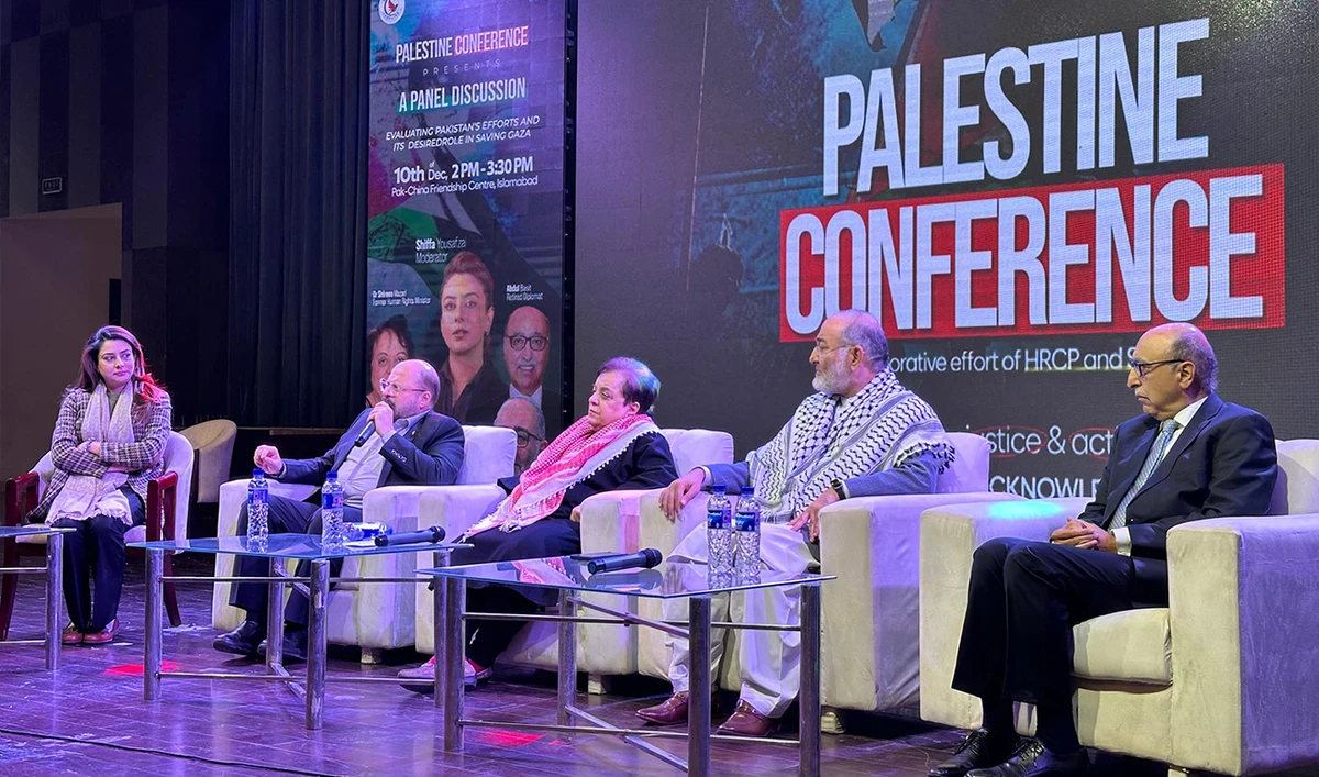 In this handout photograph, taken and released by the Save Gaza Campaign, a civil society movement based in Pakistan, Dr. Khalid Qaddoumi (2L), a spokesperson and head of the West Asia Desk of the Islamic Resistance Movement Hamas, speaks as Pakistan’s former human rights minister Shireen Mazari (3L) gestures along with Mushtaq Ahmad Khan (2R), ex-senator, and Abdul Basit (R), retired Pakistani diplomat, during a panel discussion at the Palestine Conference in Islamabad on November 10, 2024. (Photo courtesy: Facebook/Save Gaza Campaign)