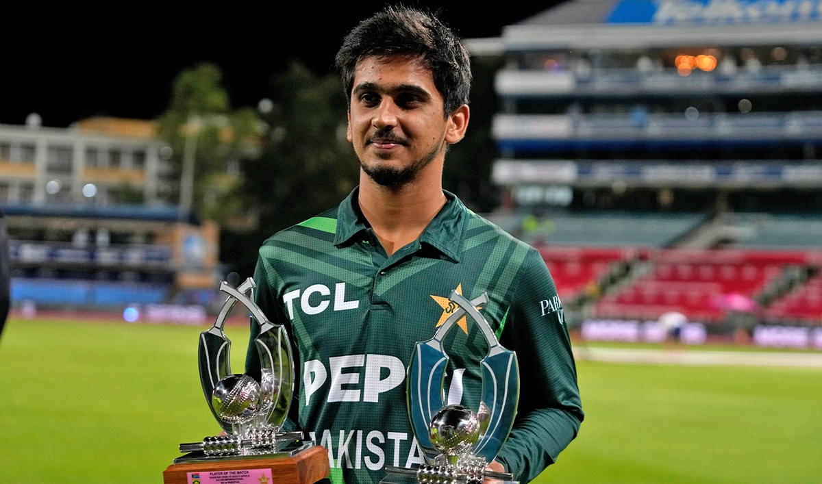 Pakistan's Saim Ayub holds the Player of the Match and Player of the Series trophies following the third International cricket match between South Africa and Pakistan, at the Wanderers stadium in Johannesburg, South Africa, on December 22, 2024. (AP)