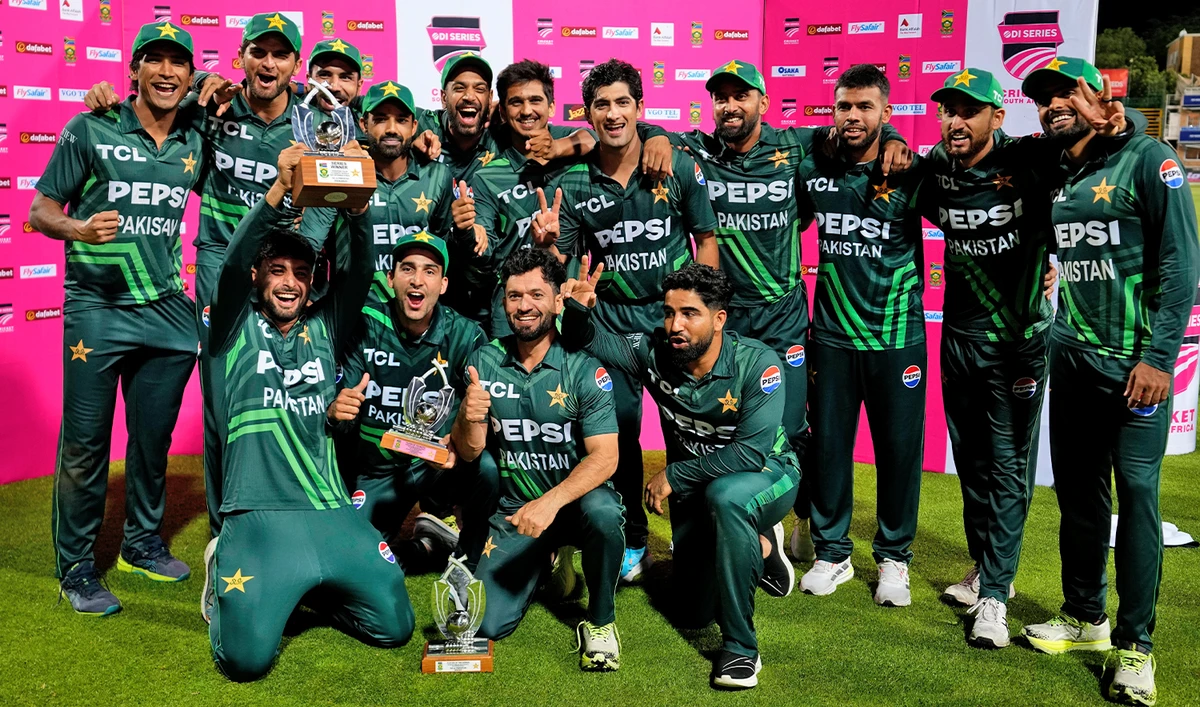 Pakistan's players pose with the trophy following the third International cricket match between South Africa and Pakistan, at the Wanderers stadium in Johannesburg, South Africa, on December 22, 2024. (AP)