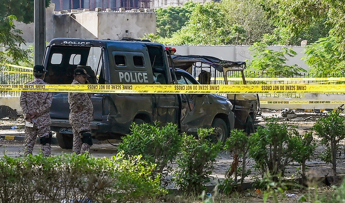 Security personnel inspect the site, a day after an explosion allegedly by separatist militants targeted a high-level convoy of Chinese engineers and investors near the Karachi international airport in Karachi on October 7, 2024. (AFP/File)