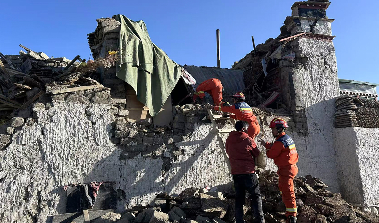 In this photo released by Xinhua News Agency, rescue workers search for survivors in the aftermath of an earthquake in Changsuo Township of Dingri in Xigaze, southwestern China’s Tibet Autonomous Region on January 7, 2025. (Xinhua via AP)