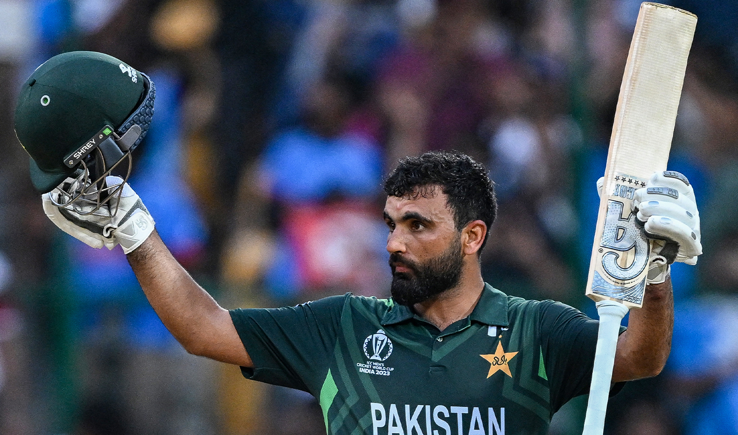 Pakistan's Fakhar Zaman celebrates after scoring a century (100 runs) during the 2023 ICC Men's Cricket World Cup one-day international (ODI) match between New Zealand and Pakistan at the M. Chinnaswamy Stadium in Bengaluru on November 4, 2023. (AFP/File)