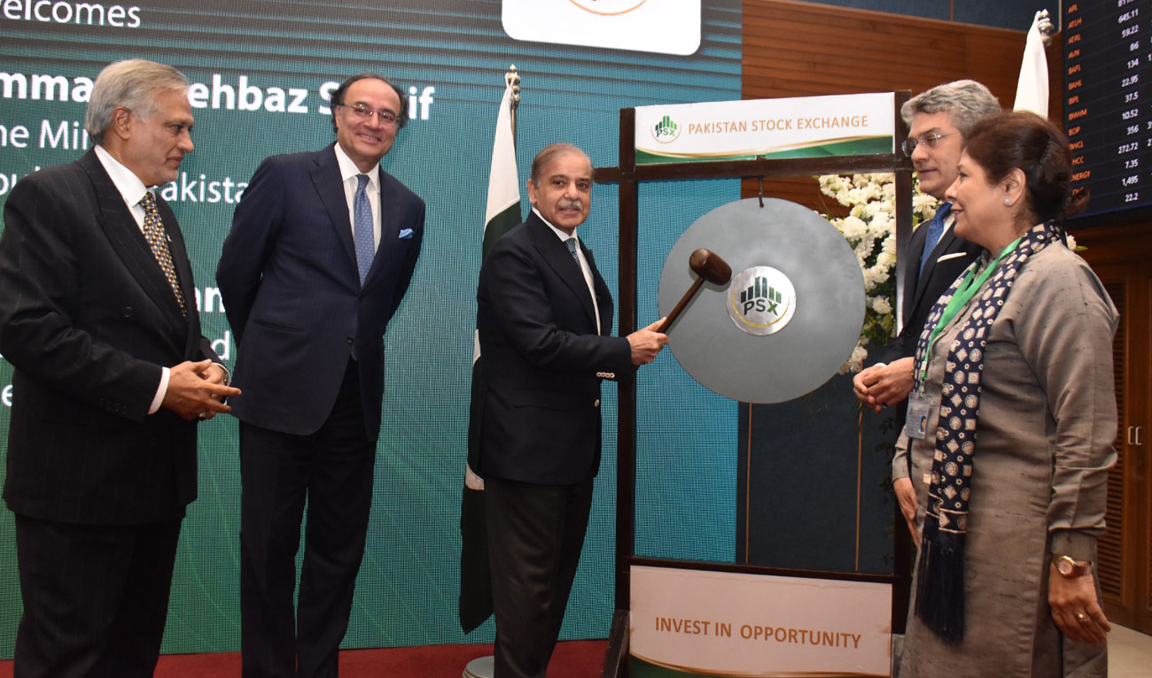 Pakistan Prime Minister Shehbaz Sharif rings the ceremonial gong during his visit to Pakistan Stock Exchange in Karachi on January 8, 2025. (PMO)