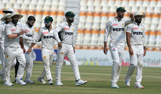 Pakistan’s captain Shan Masood (second right) and teammates walk off the field after winning the second test cricket match against England, in Multan on October 18, 2024. (AP/File)