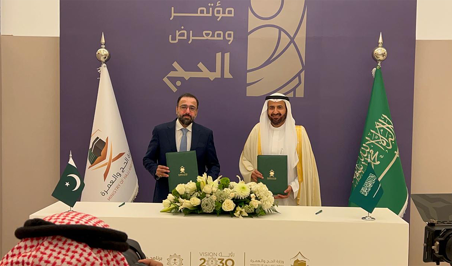 Pakistan’s Religious Affairs Minister Chaudhry Salik Hussain (left) and Saudi Minister of Hajj and Umra Dr. Tawfiq bin Fawzan Al-Rabi’ah sign Hajj agreement 2025 in Jeddah, Saudi Arabia, onn January 13, 20245. (Pakistan’s religion ministry)