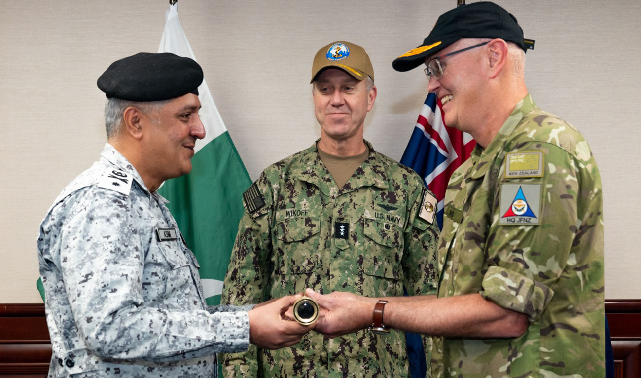 In this handout photo, released on January 16, 2025, Pakistan Navy’s Commander Combined Task Force (CTF) – 150 Commodore Asim Sohail Malik (left) hands over the Command to Commodore Rodger Ward of Royal New Zealand Navy at the Combined Maritime Forces Headquarters in Bahrain. (Photo courtesy: Pakistan Navy)