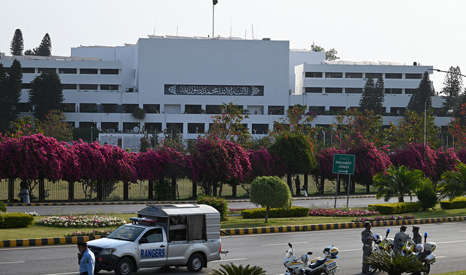 Security personnel patrol outside the Parliament House building in Islamabad on April 9, 2022. (AFP/File)