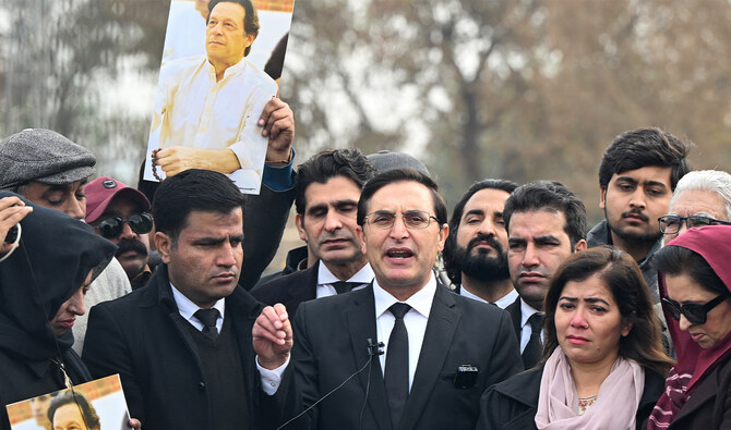 Former prime minister Imran Khan's Pakistan Tehreek-e-Insaaf (PTI) party's chairman and barrister Gohar Ali Khan (C) speaks to media outside the Adiala prison in Rawalpindi on January 17, 2025. (AFP/File)