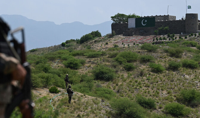 Pakistani troops patrol along Pakistan-Afghanistan border at Big Ben post in the Khyber district of the Khyber Pakhtunkhwa province on August 3, 2021. (AFP/File)