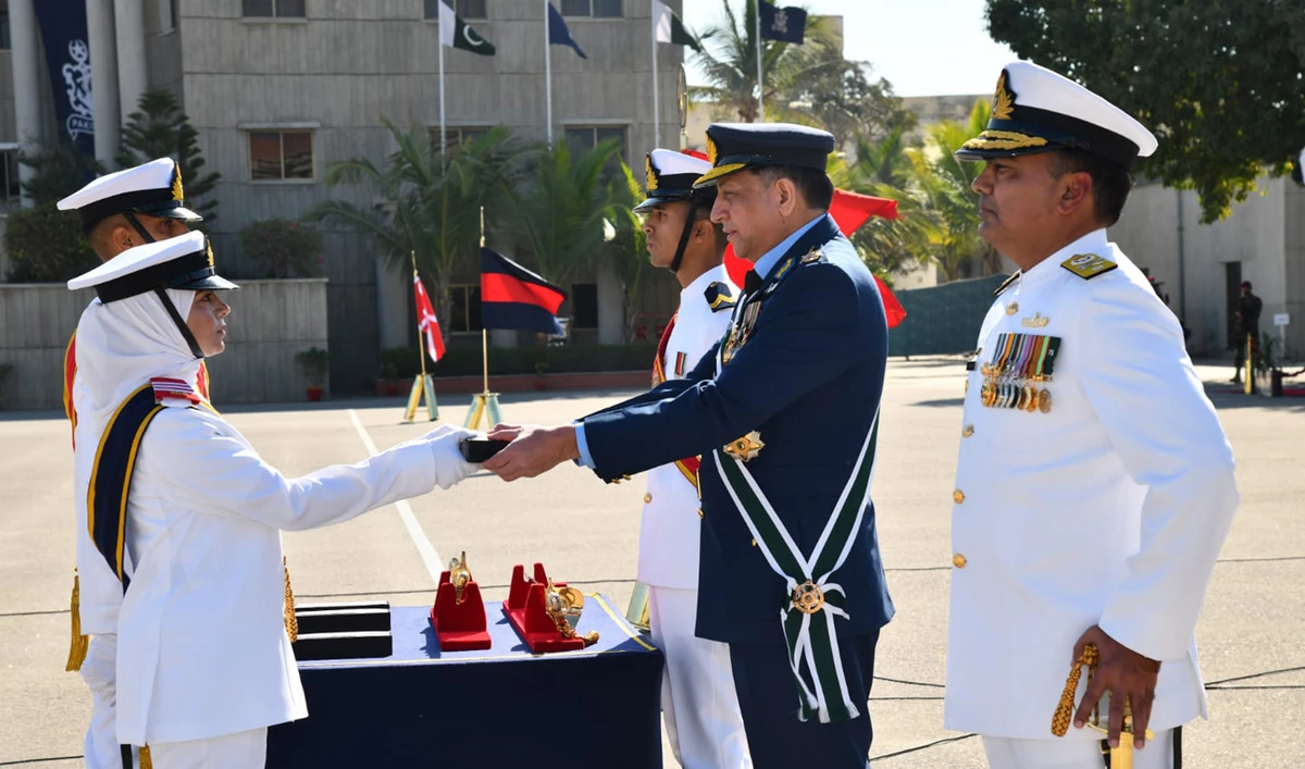 In this handout photo, released by Pakistan Navy on January 4, 2025, Chief of the Air Staff, Air Chief Marshal Zaheer Ahmed Baber Sidhu, awards Commandant Gold Medal to the best SSC cadet during the 122 Midshipmen and 30th SSC Commissioning Parade at the Pakistan Naval Academy in Karachi. (Photo courtesy: Pakistan Navy)