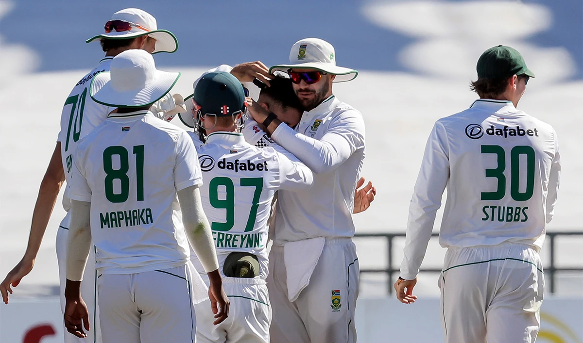 South Africa players celebrate the wicket of Pakistan’s Salman Agha during the fourth day of the second test match between South Africa and Pakistan in Cape Town, South Africa, on January 6, 2025. (AP)