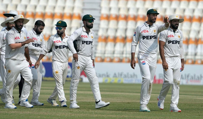 Pakistan’s captain Shan Masood (second right) and teammates walk off the field after winning the second test cricket match against England, in Multan on October 18, 2024. (AP/File)