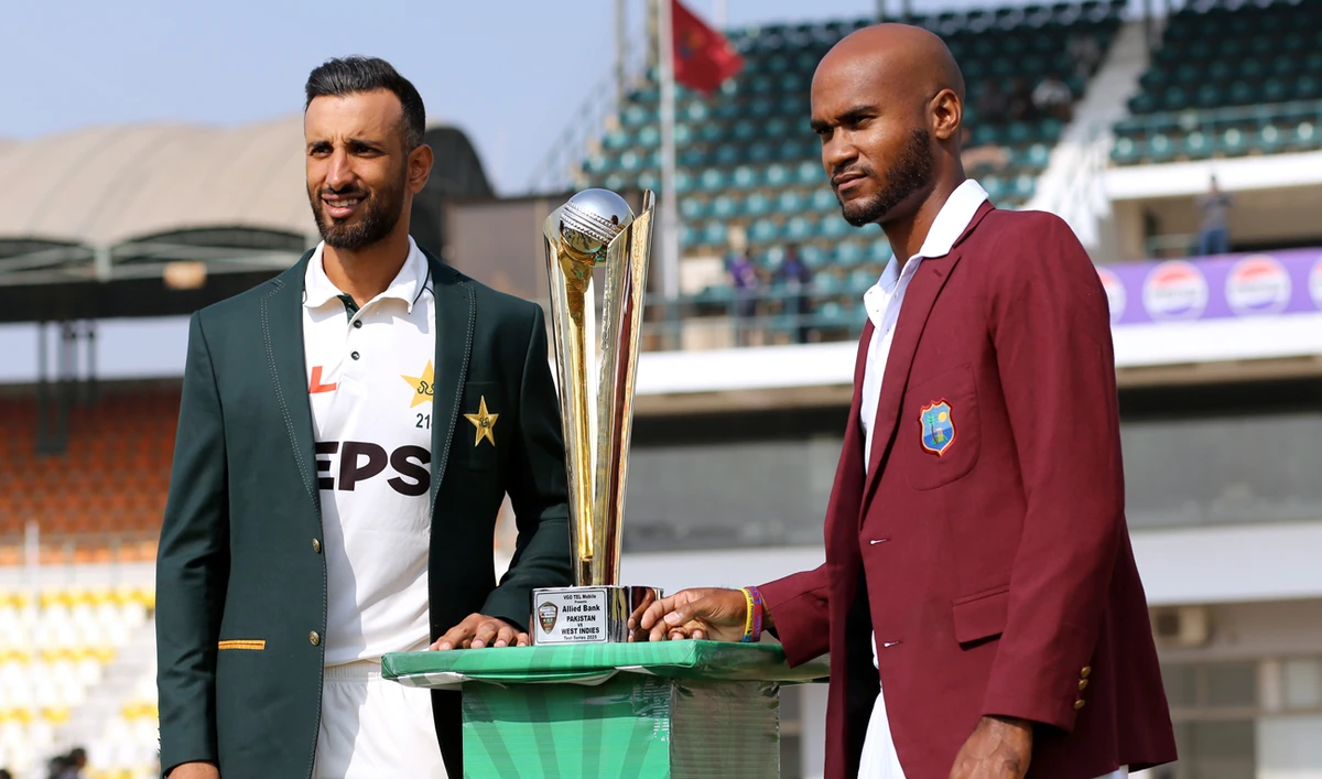 West Indies captain Kraigg Brathwaite, right, and his Pakistani counterpart Shan Masood pose for photo with test-series trophy, in Multan, Pakistan on January 16, 2025. (AP)