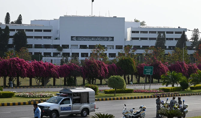 Security personnel patrol outside the Parliament House building in Islamabad on April 9, 2022. (AFP/File)