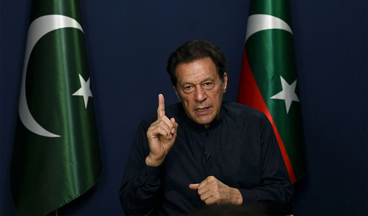 Pakistan's former prime minister Imran Khan gestures as he speaks during an interview with AFP at his residence in Lahore on May 18, 2023. (AFP/File)