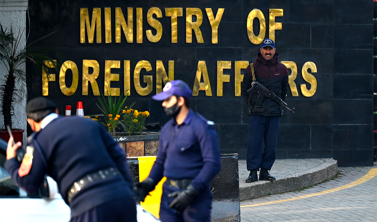 Pakistani police officers stand guard outside the Ministry of Foreign Affairs in Islamabad on January 18, 2024. (AFP/File)