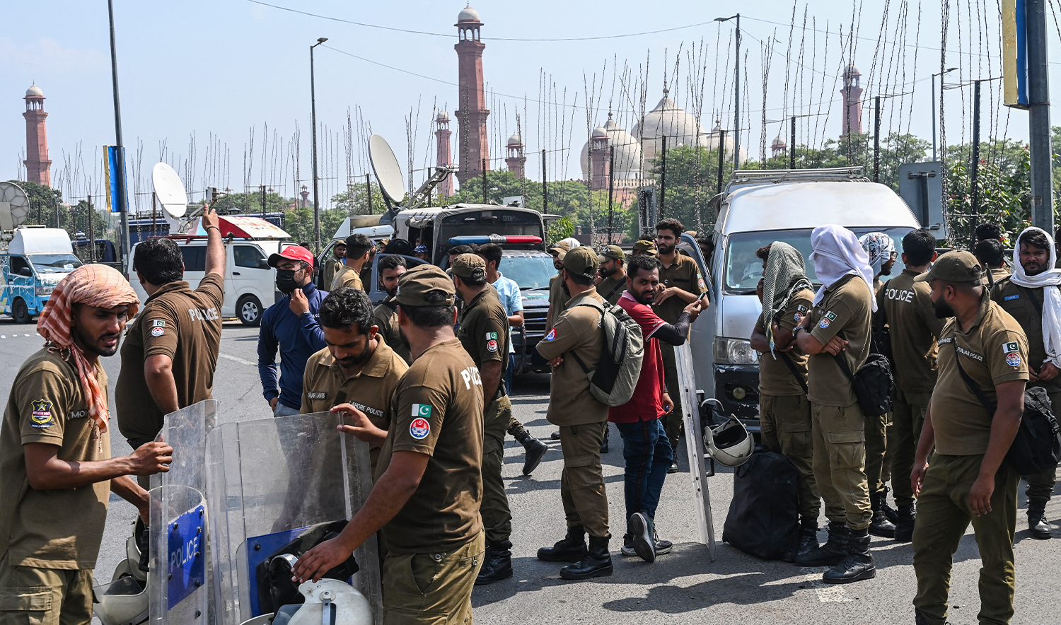 Police personnel gather before the start of a protest by supporters of former Prime Minister Imran Khan's Pakistan Tehreek-e-Insaf (PTI) party in Lahore on October 5, 2024. (AFP/File)