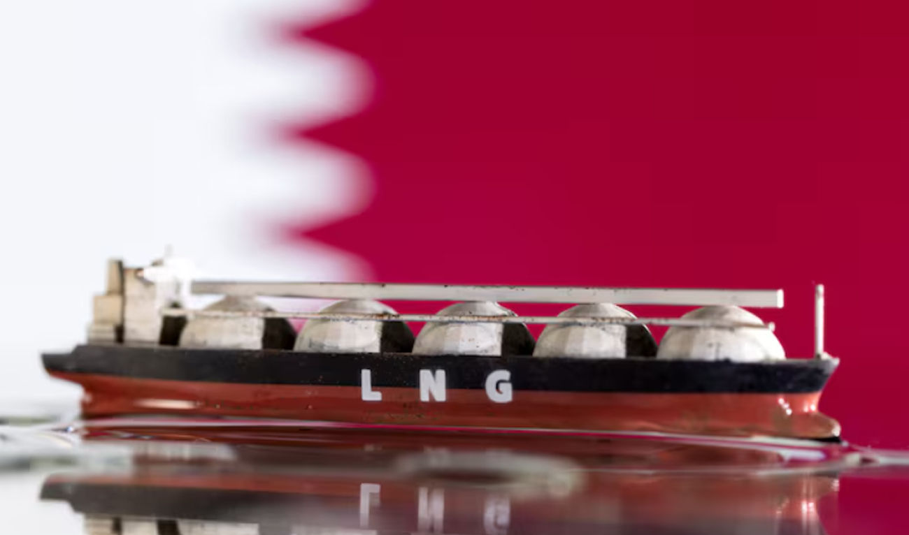 Model of LNG tanker is seen in front of Qatar's flag in this illustration taken on May 19, 2022. (REUTERS/File)