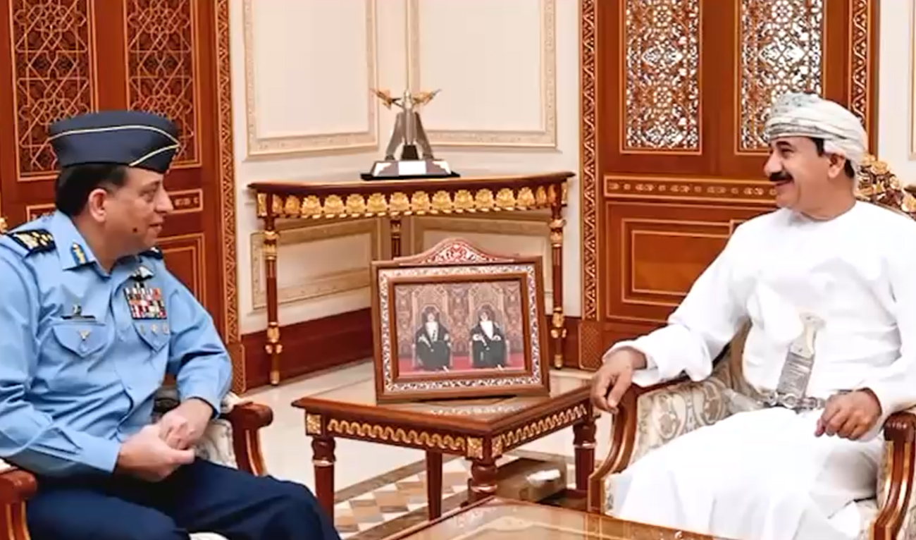 This handout photo, released by Pakistan Air Force on February 7, 2025, shows Pakistan Air Chief Marshal Zaheer Ahmed Baber Sidhu during a meeting with Omani official in Muscat. (Photo courtesy: PAF)