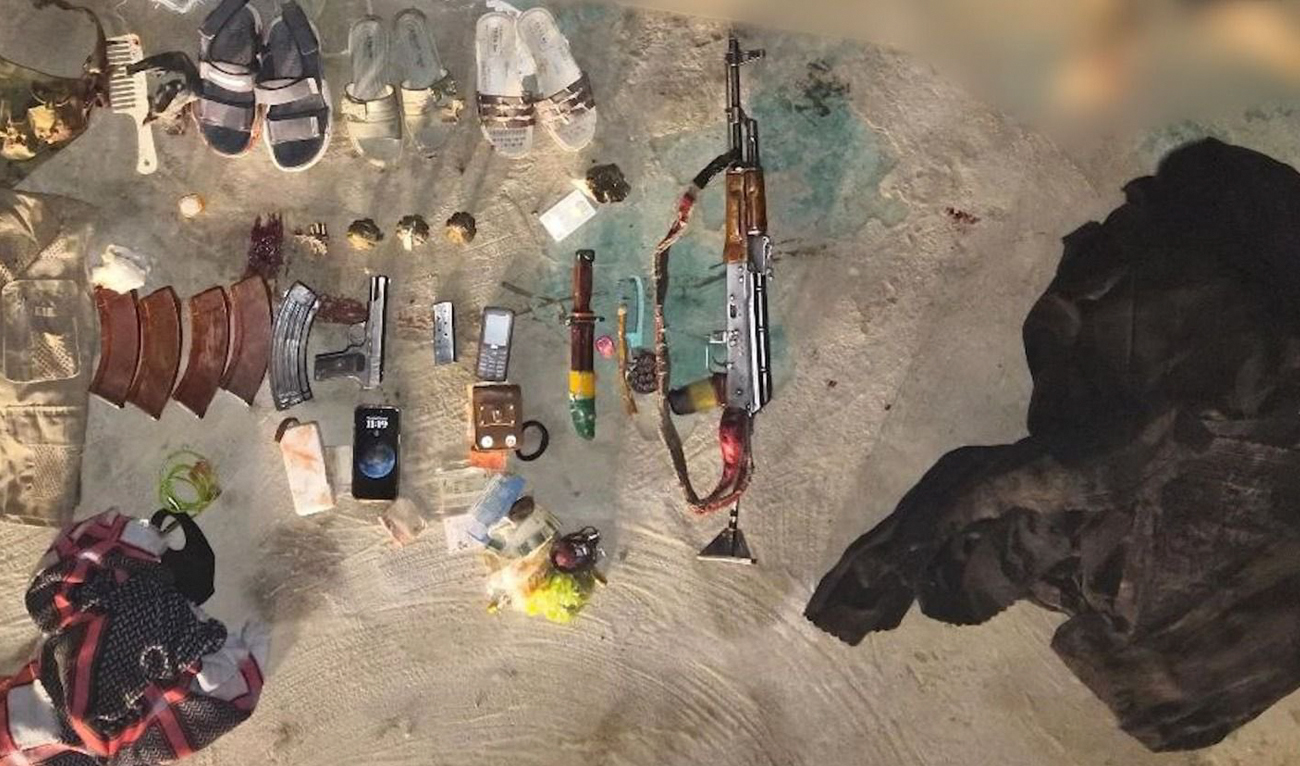 This handout photo, taken and released by Pakistan’s Inter-Services Public Relations (ISPR) on February 7, 2025, shows weapons and ammunition recovered from the slain militants during an operation in Khyber Pakhtunkhwa province. (Handout/ISPR)