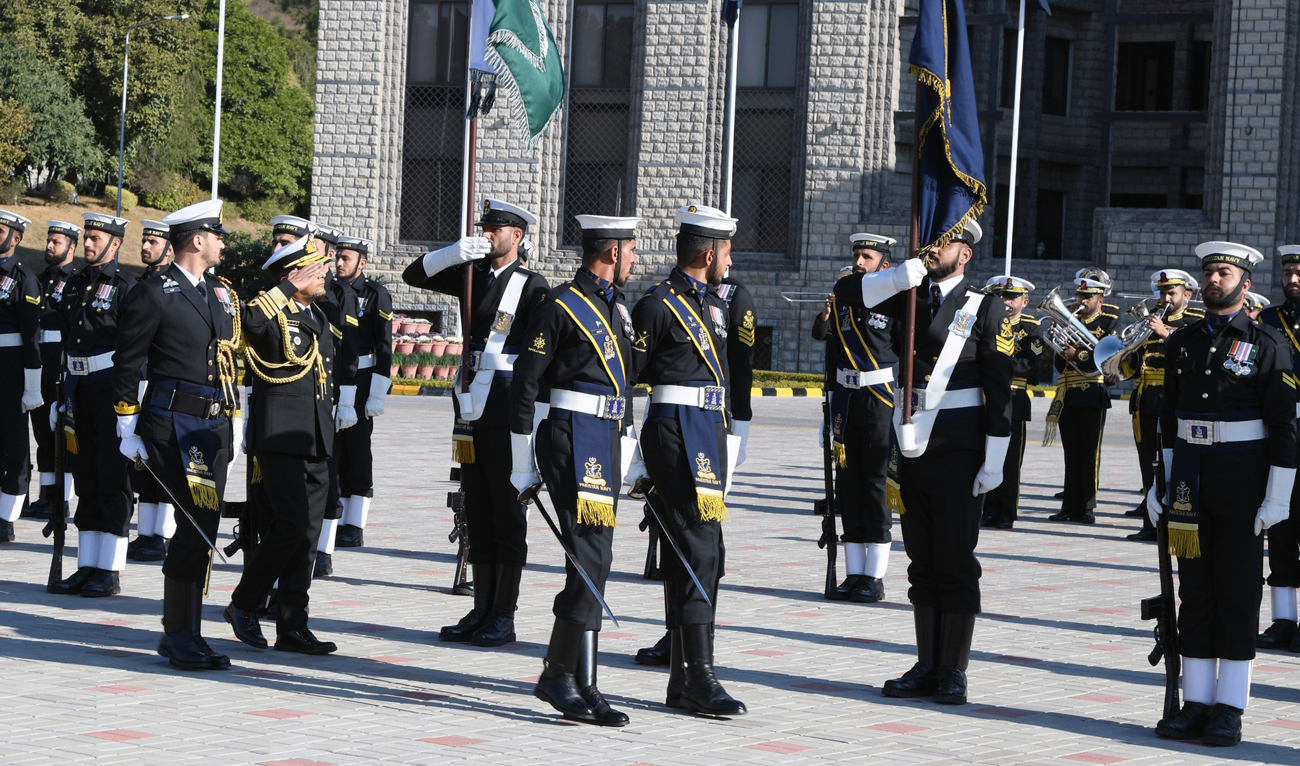 In this handout photograph, taken and released by the Director General Public Relations of Pakistan Navy on February 7, 2025, Bangladesh Chief of the Naval Staff Admiral M Nazmul Hassan reviews Guard of Honor during his visit at the Naval Headquarters in Islamabad. (Handout/Pakistan Navy)