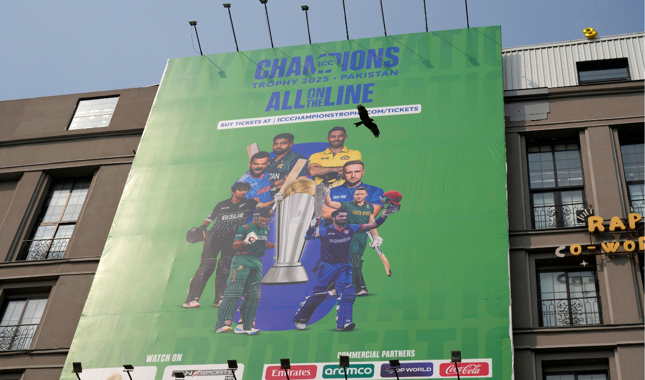 A billboard depicting portraits of the various famous cricketers installed at a building in preparation of upcoming ICC Champions Trophy 2025, in Lahore, Pakistan, Sunday, February 16, 2025. (AP)
