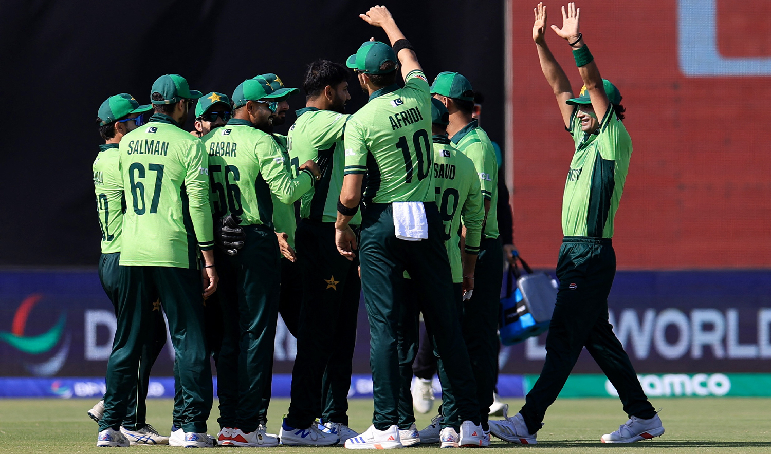 Pakistan's Haris Rauf celebrates with teammates after taking the wicket of New Zealand's Daryl Mitchell, caught out by Shaheen Shah Afridi during the ICC Men's Champions Trophy Pakistan v New Zealand match at the National Stadium in Karachi, Pakistan, on February 19, 2025. (REUTERS)