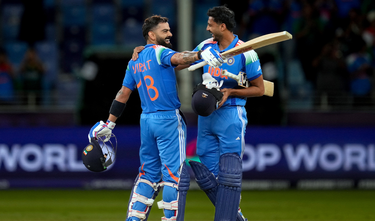 India’s Virat Kohli (left) and Axar Patel celebrate after winning against Pakistan during the ICC Champions Trophy cricket match between India and Pakistan at Dubai International Cricket Stadium in Dubai, United Arab Emirates, on February 23, 2025. (AP)