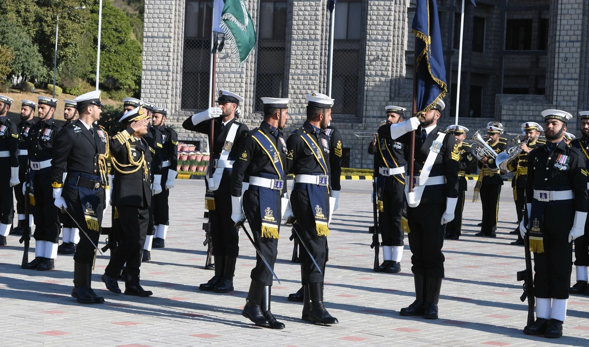 In this handout photograph, taken and released by the Director General Public Relations of Pakistan Navy on February 7, 2025, Bangladesh Chief of the Naval Staff Admiral M Nazmul Hassan reviews Guard of Honor during his visit at the Naval Headquarters in Islamabad. (Handout/Pakistan Navy)