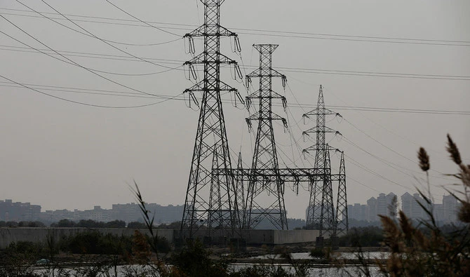 This file photo, taken on January 24, 2023, shows a power transmission tower in Karachi. (REUTERS/File)