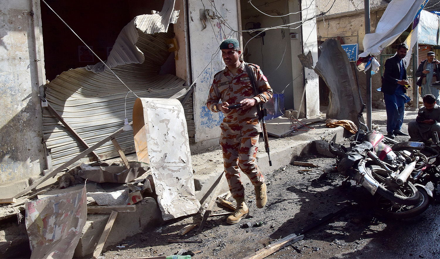 A security official checks the site of a bomb blast in Quetta, Pakistan, on Feb. 28, 2025. (AP)