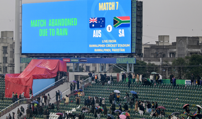 Spectators leave the stands after the ICC Champions Trophy one-day international (ODI) cricket match between Australia and South Africa was abandoned due to rain, at the Rawalpindi Cricket Stadium in Rawalpindi on February 25, 2025. (AFP/File)