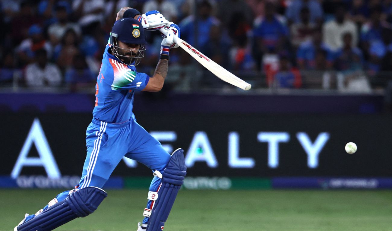 India's Virat Kohli watches the ball after playing a shot during the ICC Champions Trophy one-day international (ODI) semi-final cricket match between Australia and India at the Dubai International Stadium in Dubai on March 4, 2025. (AFP)