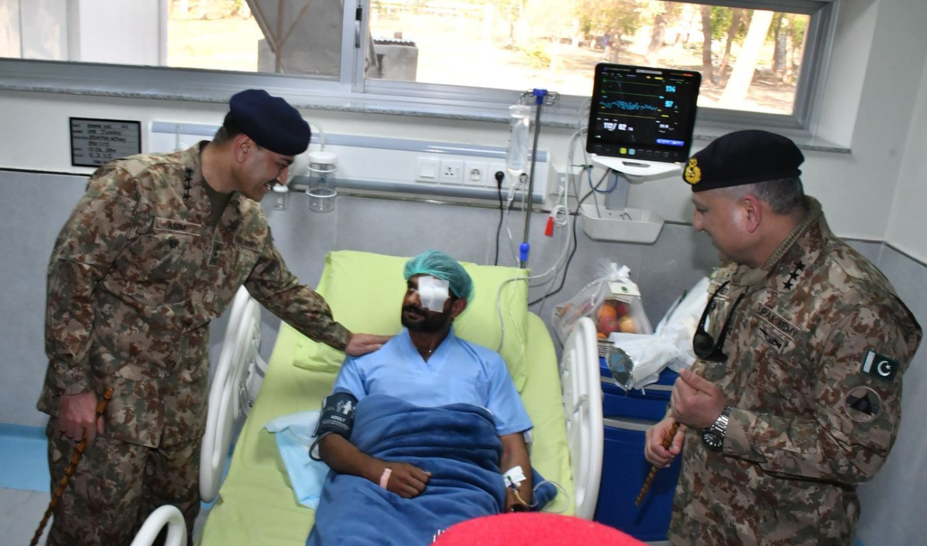 Pakistan army chief General Syed Asim Munir visits survivors of attack on a cantonment in Bannu district in the country’s northwest on March 6, 2025. (ISPR)
