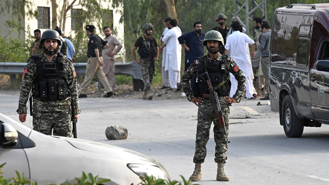 Pakistani security personnel stand guard at the Hayatabad area of Peshawar, Pakistan, on July 18, 2023. (AFP/File)