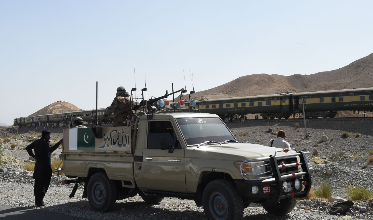 Pakistani soldiers look on near a train at the site of two explosions in the town of Much, 55 kilometres east of Balochistan's provincial capital Quetta, on October 7, 2016. (AFP/File)