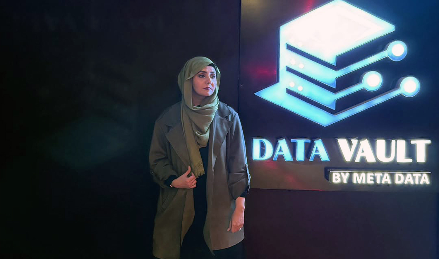 Mehwish Salman Ali, tech entrepreneur, stands next to the her company's 'Data Vault' logo on February 6, 2025. (Mehwish Salman Ali)