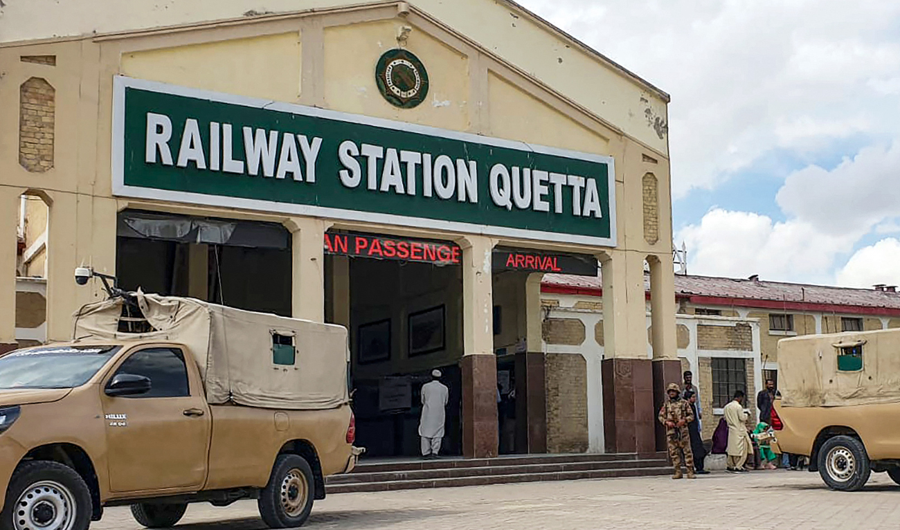A paramilitary soldier stands guard at a railway station in Quetta on March 12, 2025. (AFP)