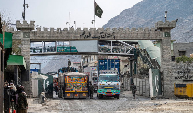 In this photo taken on February 2, 2023, Afghan cargo trucks enter Pakistan at the Afghanistan-Pakistan Torkham border post, in Nangarhar province. (AFP/File)