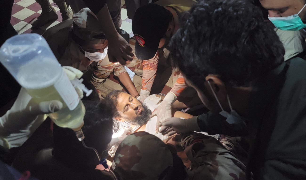 Paramedics treat an injured passenger at the Mach railway station, in Mach, southwestern Balochistan province on March 11, 2025. (AFP/File)