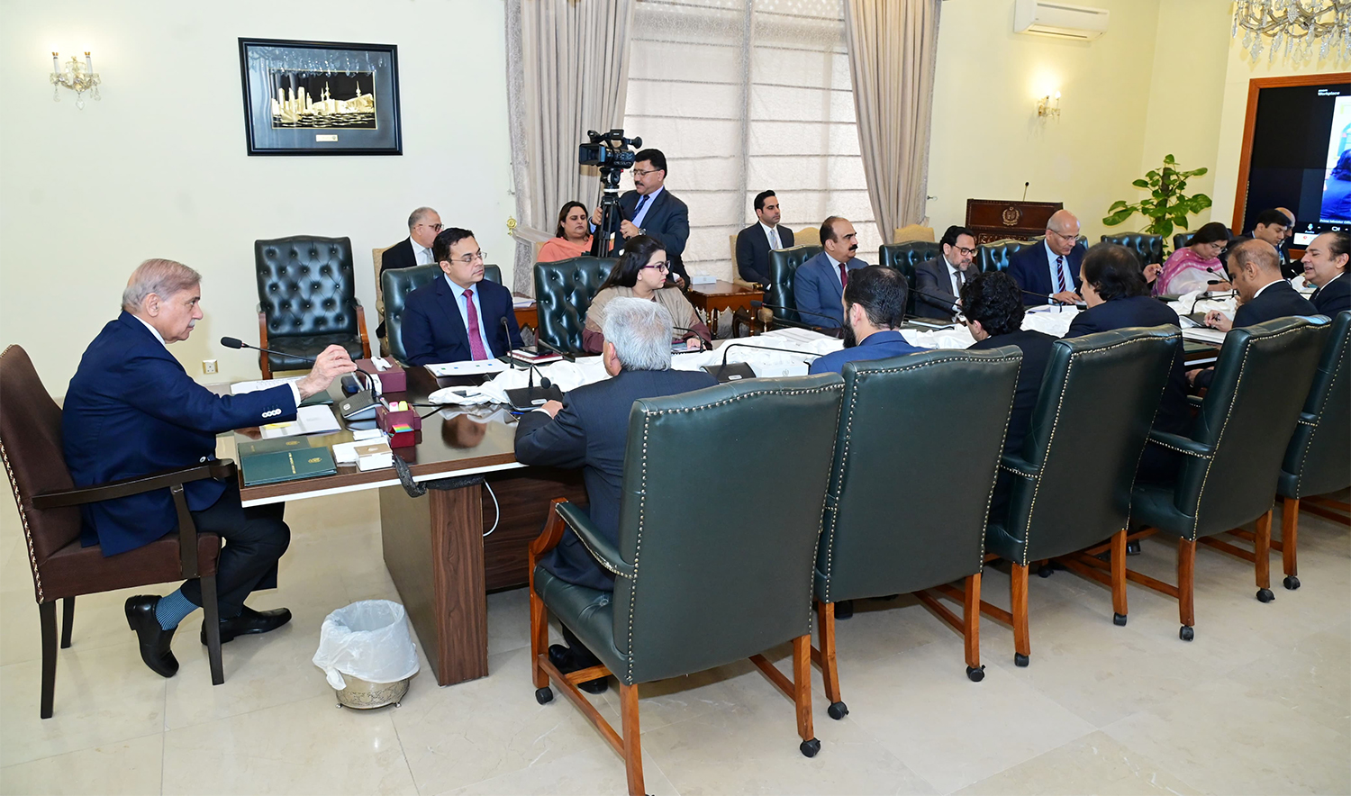Prime Minister Shehbaz Sharif (left) chairs a review meeting on Prime Minister's Ramzan Relief Package 2025 in Islamabad, Pakistan, on March 24, 2025. (Government of Pakistan)