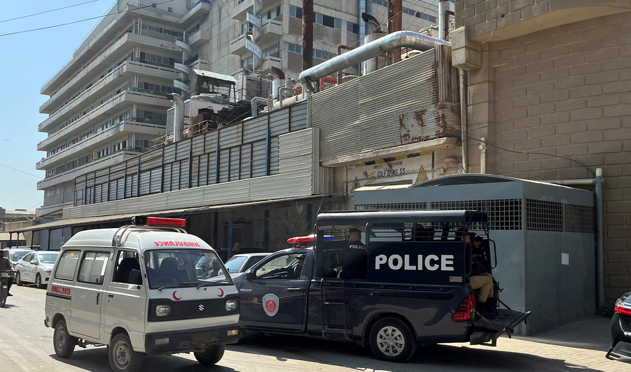 A view of a police mobile and an ambulance outside a factory where, according to police, two Chinese nationals were shot at and injured, in Karachi, Pakistan November 5, 2024. (Reuters/File)