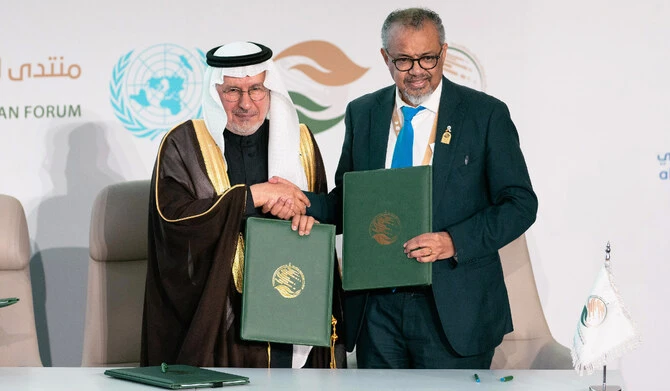 Supervisor-General of the Saudi aid agency KSrelief, Dr. Abdullah Bin Abdulaziz Al Rabeeah and WHO Director-General, Tedros Adhanom Ghebreyesus (right), posed for a photo after signing a cooperation deal to eradicate polio, on the sidelines of the 4th Riyadh International Humanitarian Forum in Riyadh, Saudi Arabia on February 27, 2025. (SPA)