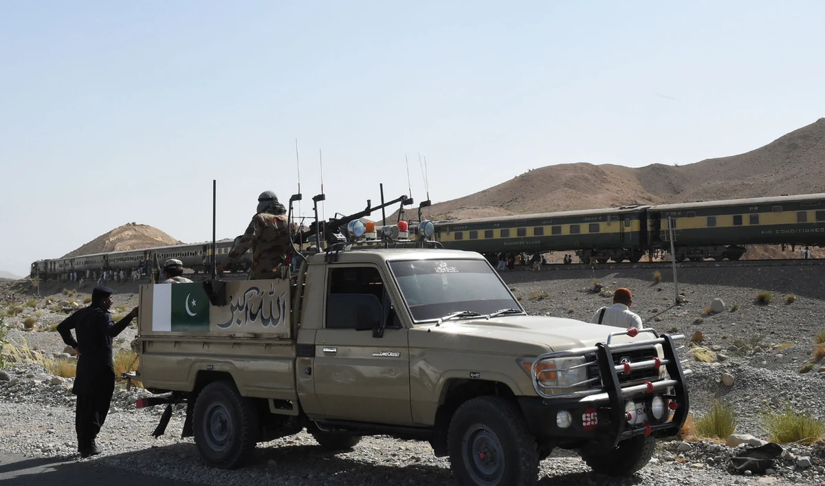 Pakistani soldiers look on near a train at the site of two explosions in the town of Much, 55 kilometres east of Balochistan's provincial capital Quetta, on October 7, 2016. (AFP/File)