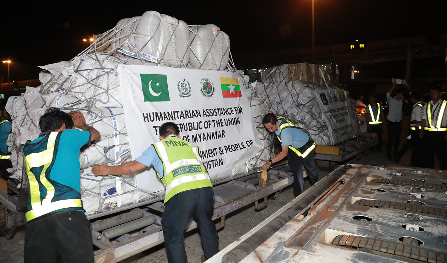 Airport staff unloads aid sent by Pakistan at Yangon International Airport in Yangon on April 2, 2025. (National Disaster Management Authority)